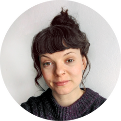 An illustration of long haired women holding a happy ginger cat.